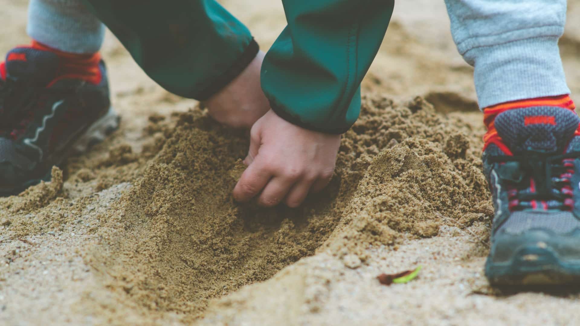 Burying Time Capsule in the Sand